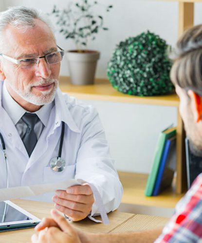 doctor listening to patient